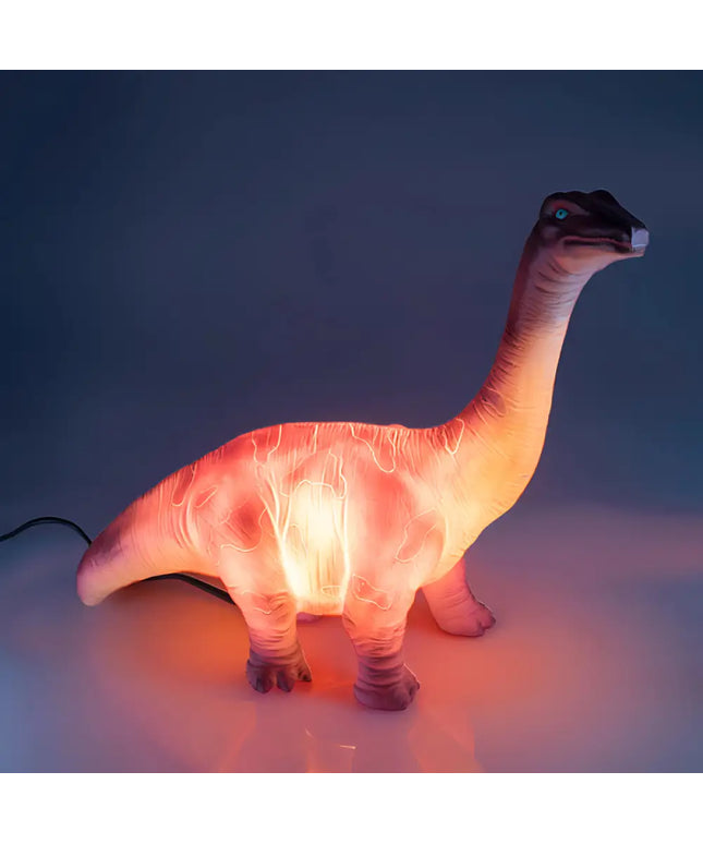 Close-up of the dinosaur LED lamp showing realistic details