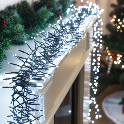 White Christmas lights garland from Cluster Lights 720 LEDs in 6 color options for festive decor