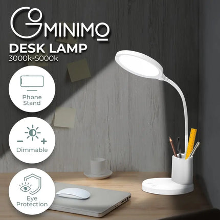 White desk lamp with integrated pen and phone holder for organized workspace