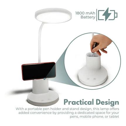 White desk lamp with integrated phone holder and pen stand for organized workspace