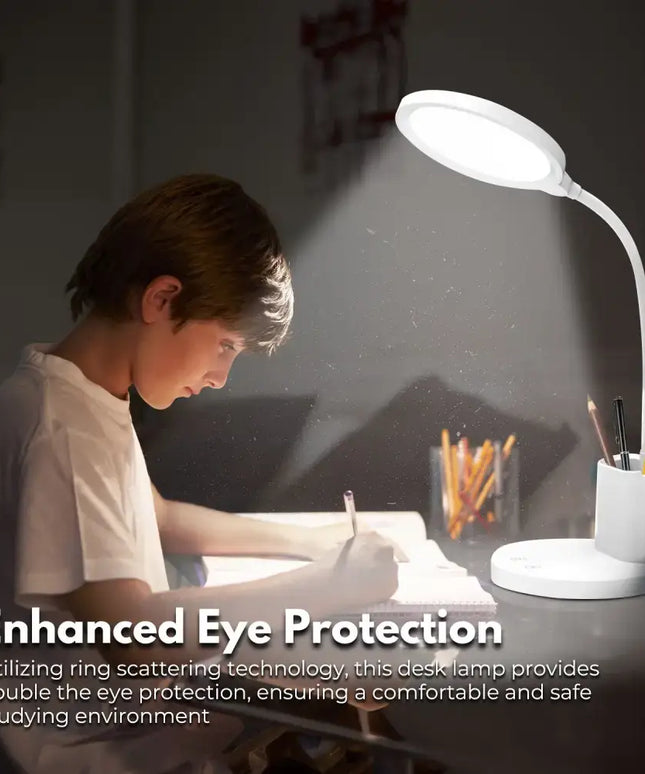 White desk lamp with integrated pen and phone holder for organized workspace