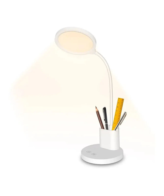 Illuminated white desk lamp with built-in pen and phone holder for organized workspace