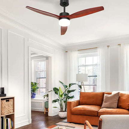 Modern ceiling fan with three wooden blades and energy-efficient AC motor