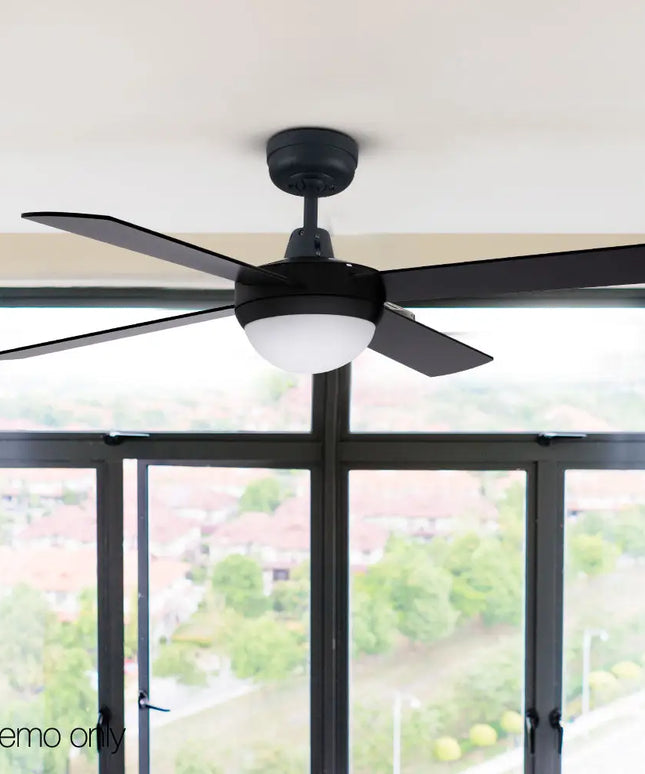 Modern ceiling fan with four wooden blades and sleek black finish