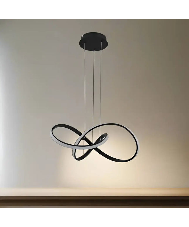 Diamanto LED pendant light with artistic black and white infinity loop design and steel wire lengths
