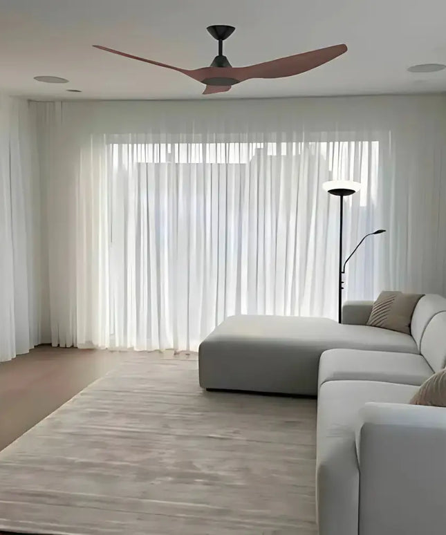 Domus Strike 60" black walnut ceiling fan installed in a living room with wood accents