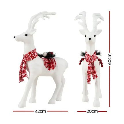 White Christmas reindeer statues with patterned scarves for Jingle Jollys Glitter Deer Ornaments