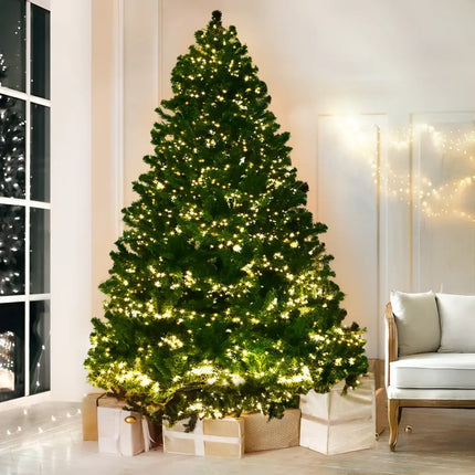Illuminated Jingle Jollys Christmas Tree with gifts and 3190 LEDs, lush holiday decoration