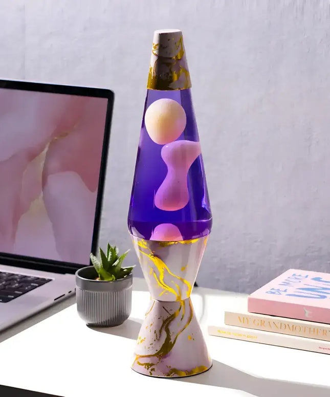 Edgy Diamond-Shaped Lava Lamp with purple liquid and hypnotic pink lava.
