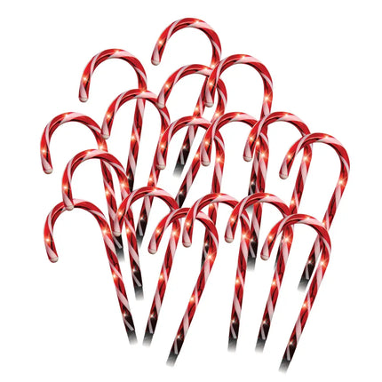 Red and white striped LED Candy Canes Path Lights decorated with string lights for festive ambiance