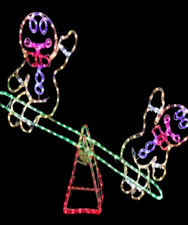 Illuminated gingerbread men on a seesaw LED Gingerbread Man Seesaw Ropelight for festive decor