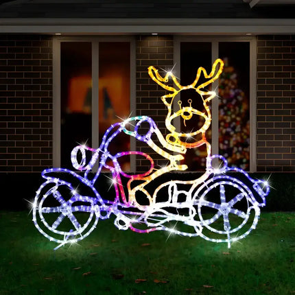 Illuminated LED Ropelight Motorbike Crew Reindeer lawn decoration at night