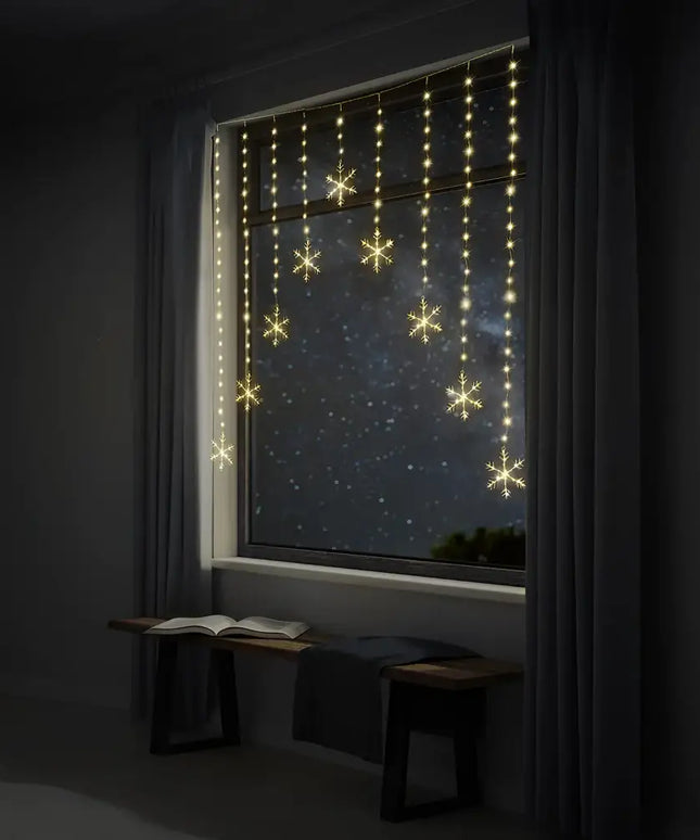 LED Snowflakes Curtain Lights in Cool White showcasing snowflake string light design