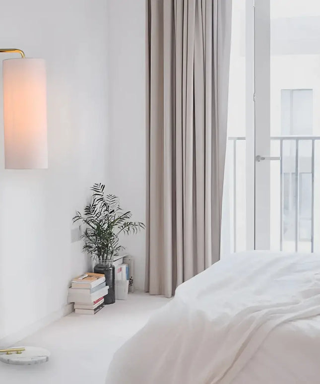 Illuminated gold floor lamp from Lexi ADELE collection featuring metal and marble design