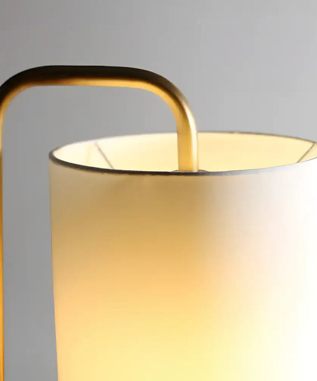 Illuminated cylindrical lamp with brass frame from Lexi ADELE Metal and Marble Floor Lamp collection