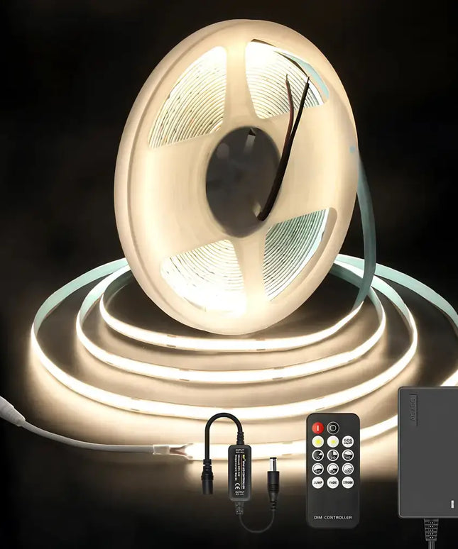 LED strip light set with remote control and power adapter on a dark background