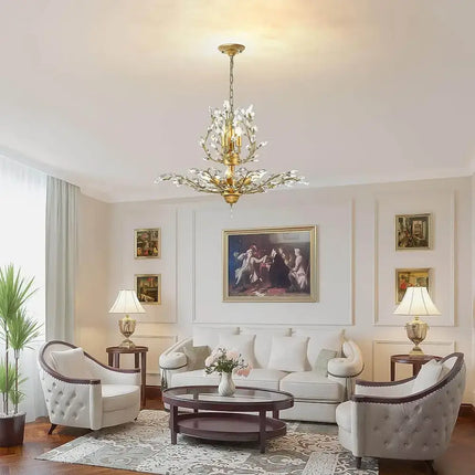 Gold crystal chandelier hanging in a stylish living room