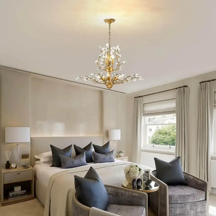 Gold chandelier with sparkling glass crystals in a modern home