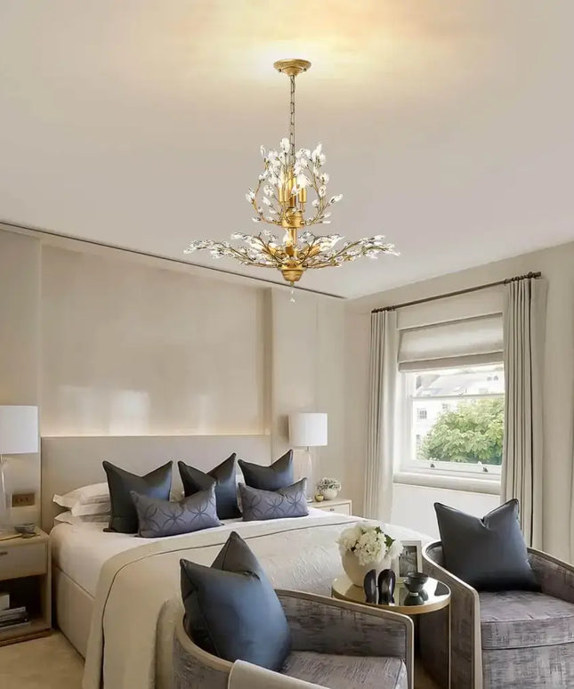 Gold chandelier with sparkling glass crystals in a modern home