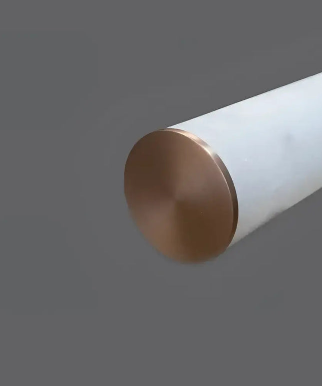 Madison Alabaster pendant light  with a bronze-colored cap on a gray background