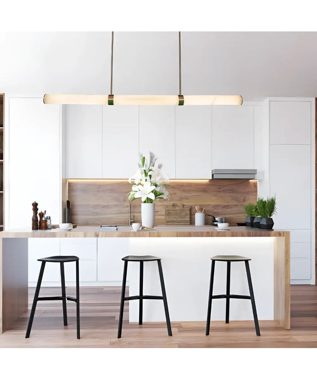 Madison Antique Brass Spanish Marble Tri-Colour LED Pendant Light illuminating a modern kitchen island