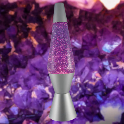 Elegant Glitter Lava Lamp – Purple liquid with flowing silver glitter in a sleek silver casing.