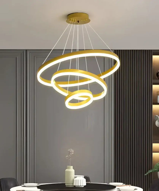 Gold circular LED chandelier from Obliq Brass 3 Rings LED Pendant Light collection