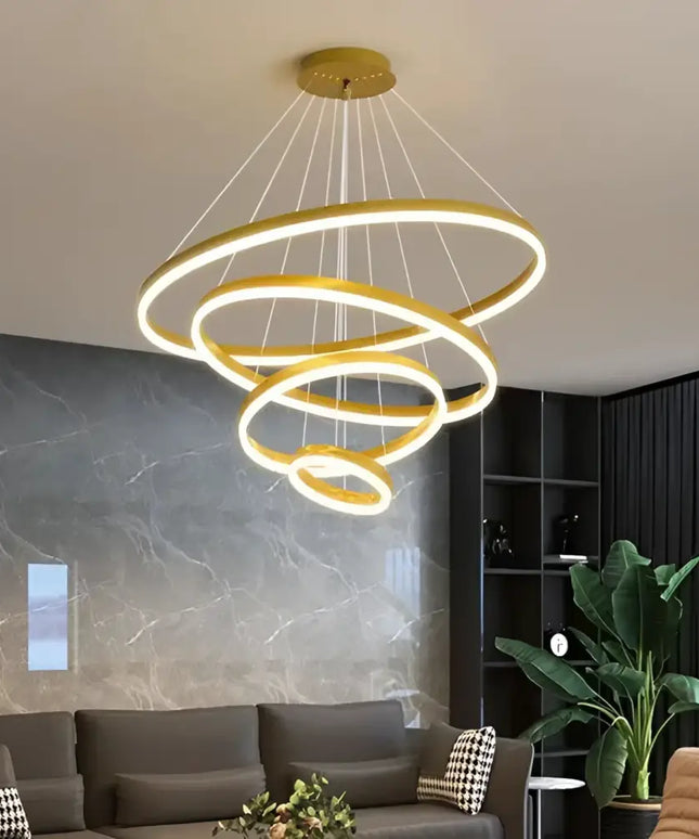 Modern gold ring chandelier from Obliq Brass 4 Rings LED Pendant Light Adjustab