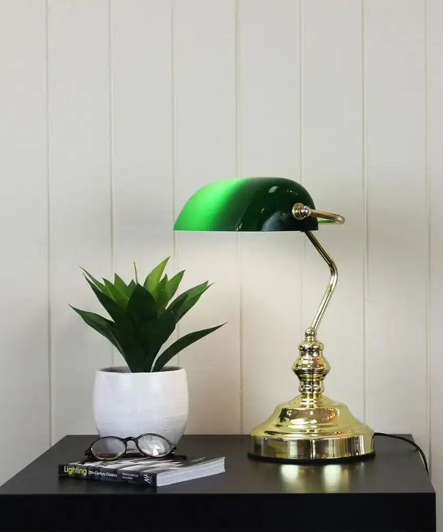Stylish Oriel Bankers Touch Table Lamp illuminating a workspace.