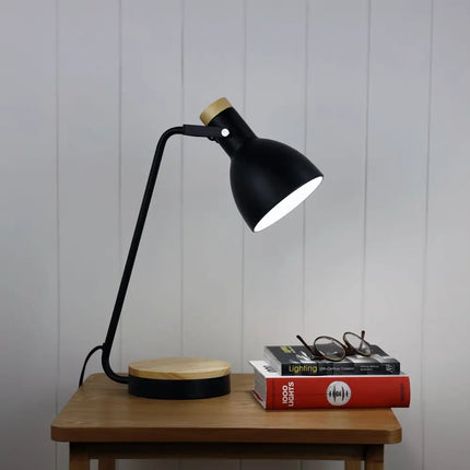 Side view of the Oriel Benny Desk Lamp featuring a modern black and blonde design.