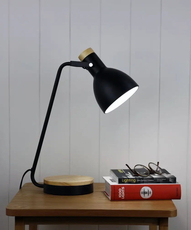 Side view of the Oriel Benny Desk Lamp featuring a modern black and blonde design.