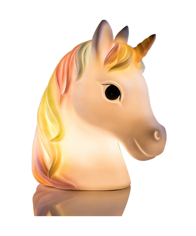 Pretty Unicorn Table Lamp glowing softly in a child’s bedroom