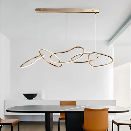 Modern abstract ring-shaped Rose Gold LED pendant light for contemporary interior decor