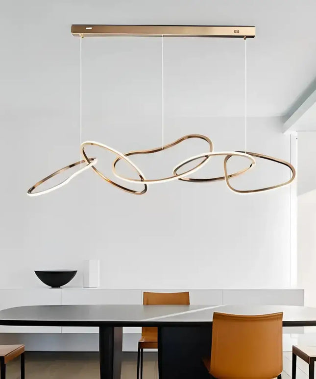 Modern abstract ring-shaped Rose Gold LED pendant light for contemporary interior decor