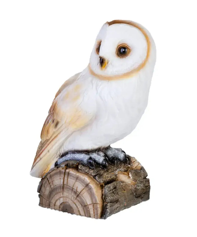 Soft golden glow emitted by the Snowy Owl Table Lamp