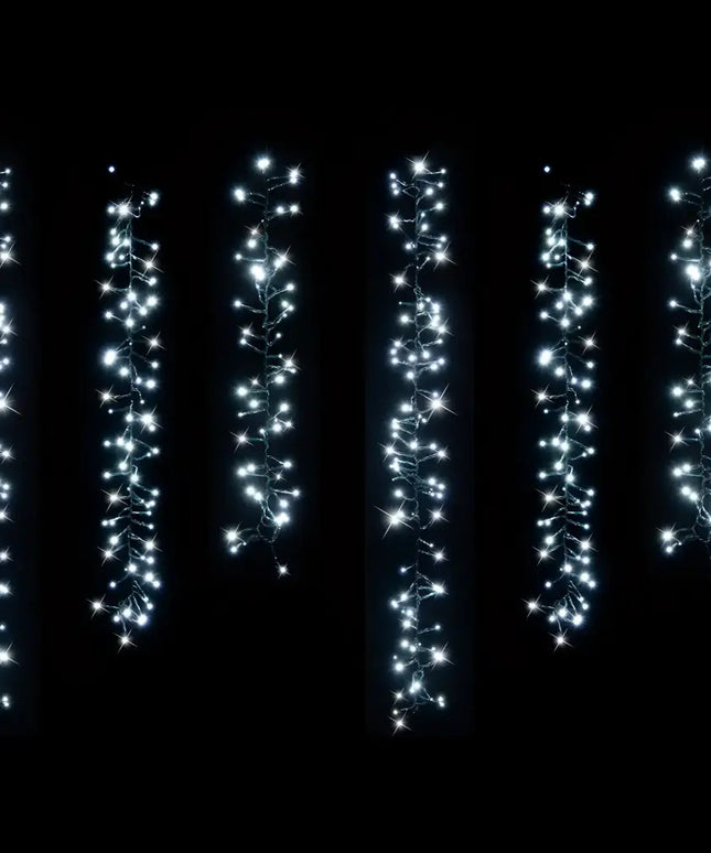 Hanging white LED fairy lights from Solar 480 LED Cluster Chain Lights available in multicolor