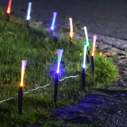 Solar Fibreoptic Path Lights illuminating a pathway with vibrant fiber optic lighting