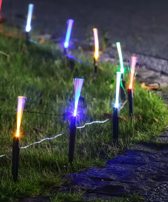 Solar Fibreoptic Path Lights illuminating a pathway with vibrant fiber optic lighting