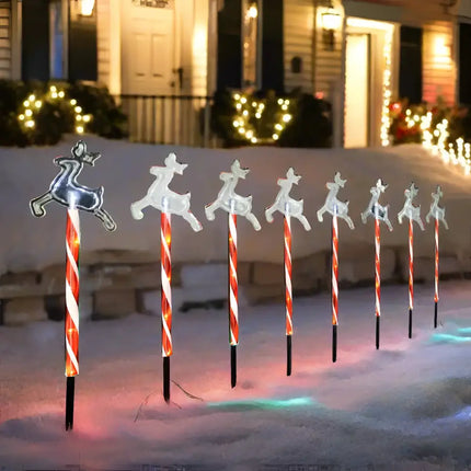 Illuminated reindeer Candy Cane pathway markers with solar LED lights in cool white