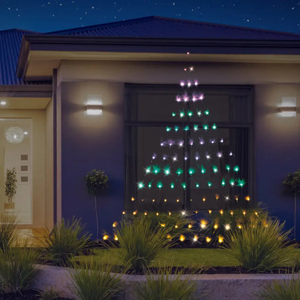 Illuminated Christmas tree window display with Solar LED Rainbow Christmas Tree Wall Net Lights