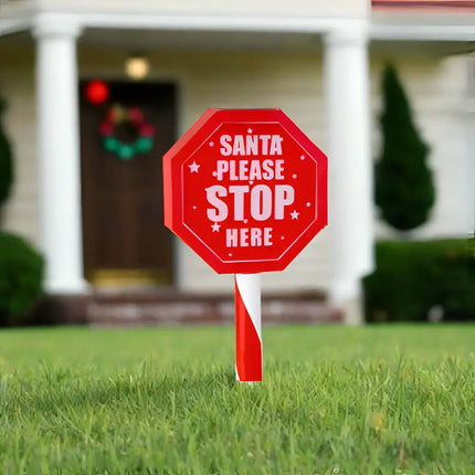Red octagonal Santa stop sign displayed on Solar Santa Stop Sign Stake 45cm