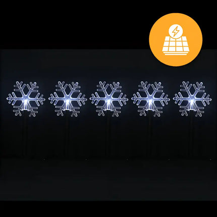 Illuminated snowflake lawn decorations from Solar Snowflake Path Lights 5 Pack in Cool White