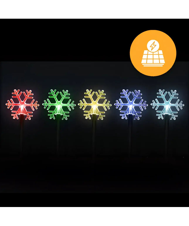 Solar-powered multicolored snowflake lights for outdoor pathway decor