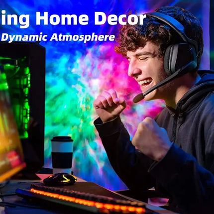 Excited gamer wearing a headset enjoying the Star Projector Galaxy Light Bedroom connected with Alexa and Google Home