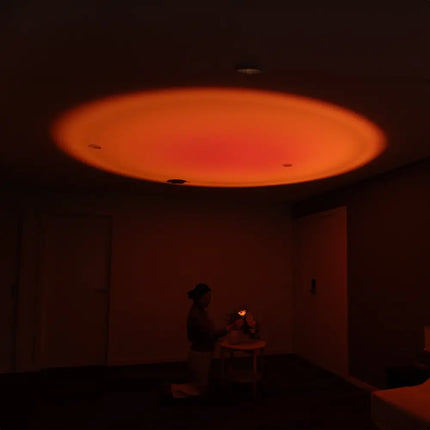 Orange ceiling light from Sunset Lamp USB LED Projector with 180-degree rotation