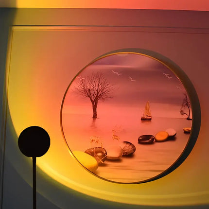 Circular landscape painting displaying vibrant sunset and rainbow colors on Sunset Lamp USB LED Projector