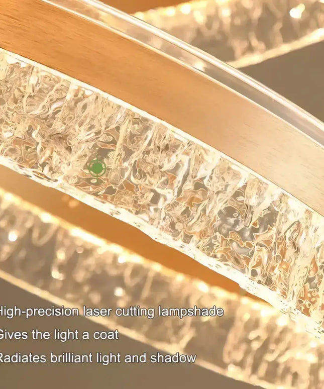 Modern crystal chandelier from the VICTORIA 180W Gold 3 Rings Water Ripple LED collection