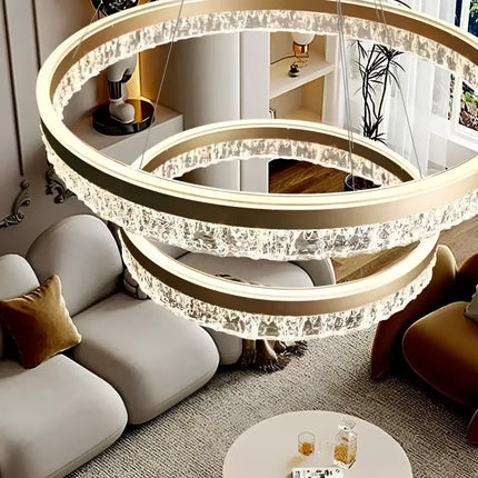 Three-tiered crystal ring chandelier from VICTORIA 180W Gold 3 Rings Water Ripple LED collection
