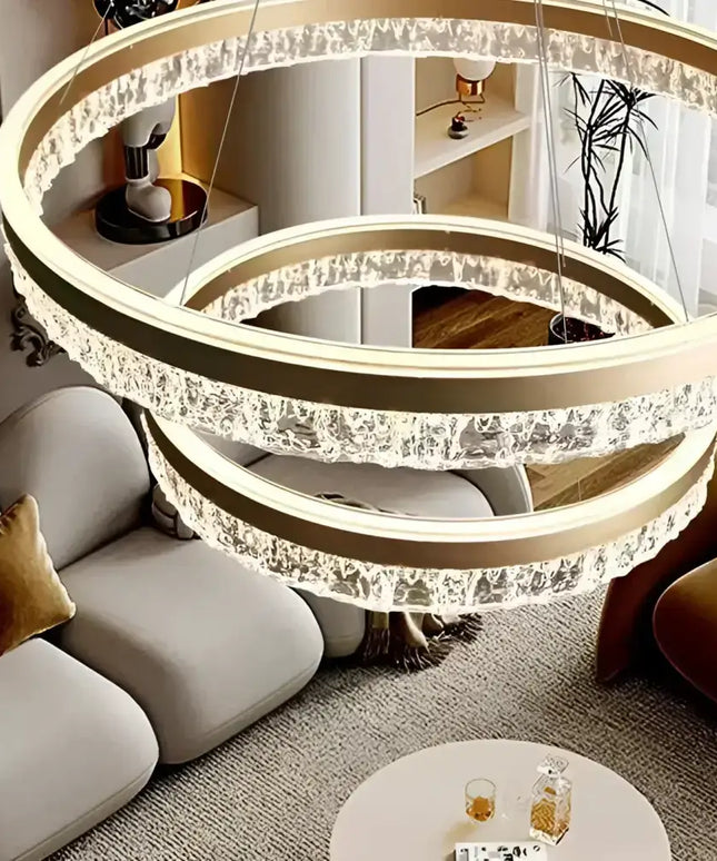 Three-tiered crystal ring chandelier from VICTORIA 180W Gold 3 Rings Water Ripple LED collection