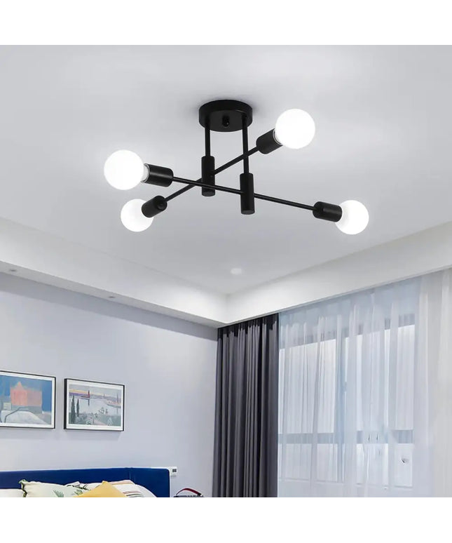 Black four-bulb ceiling light fixture from Voltaro 4-Light Modern Industrial Pendant design